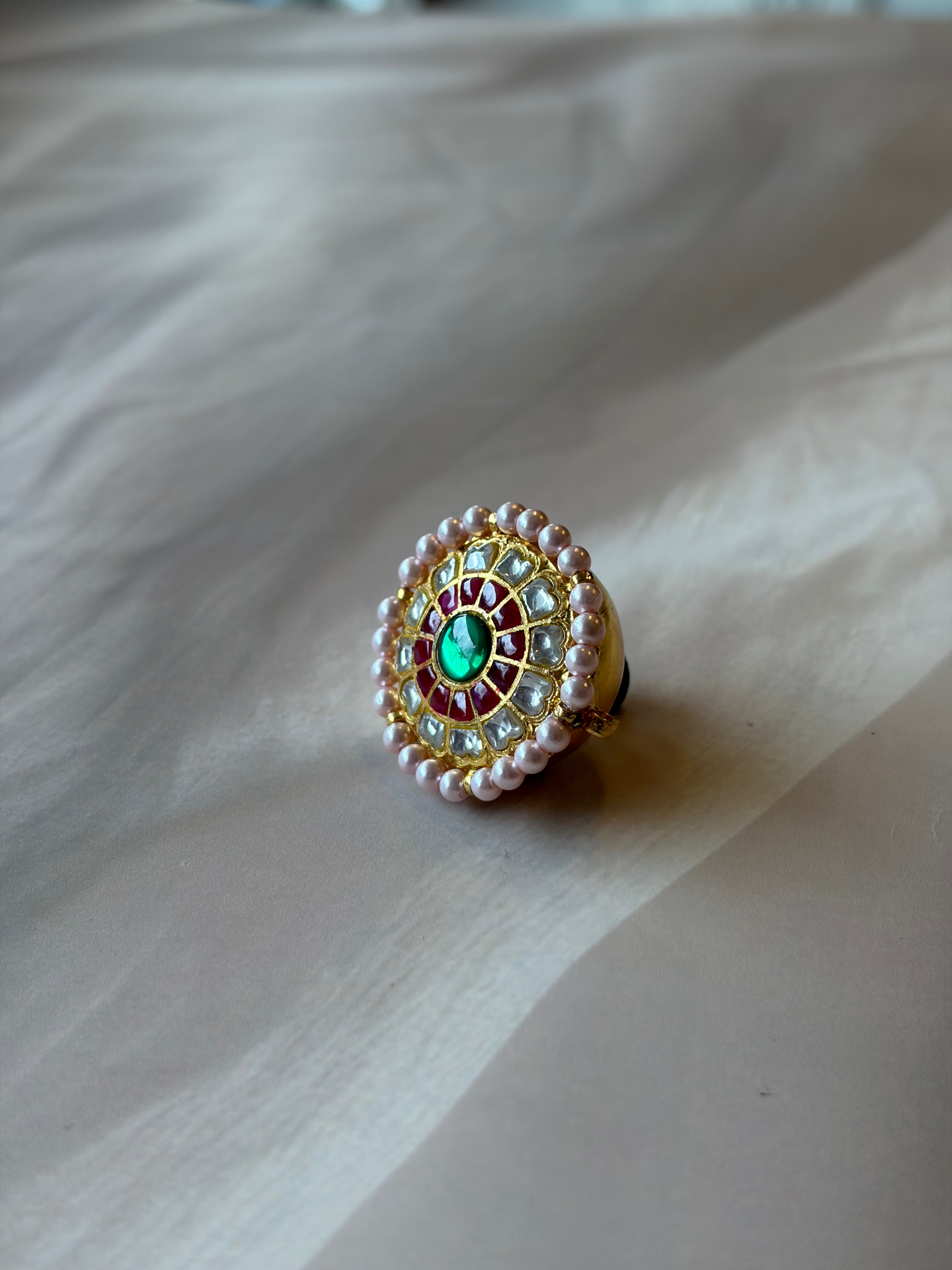 Green Centre Stone Red & White Gold Plated Rakhadi